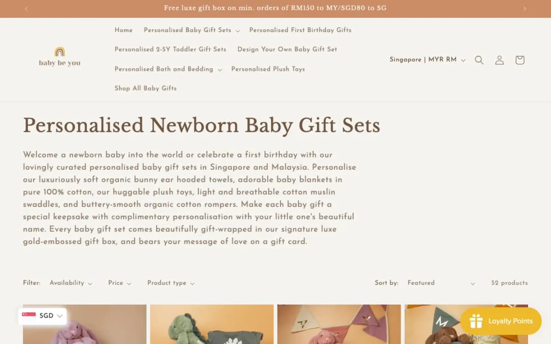 Screenshot of the Baby Be You personalised newborn baby gift sets page, taken 16 Oct 2026
