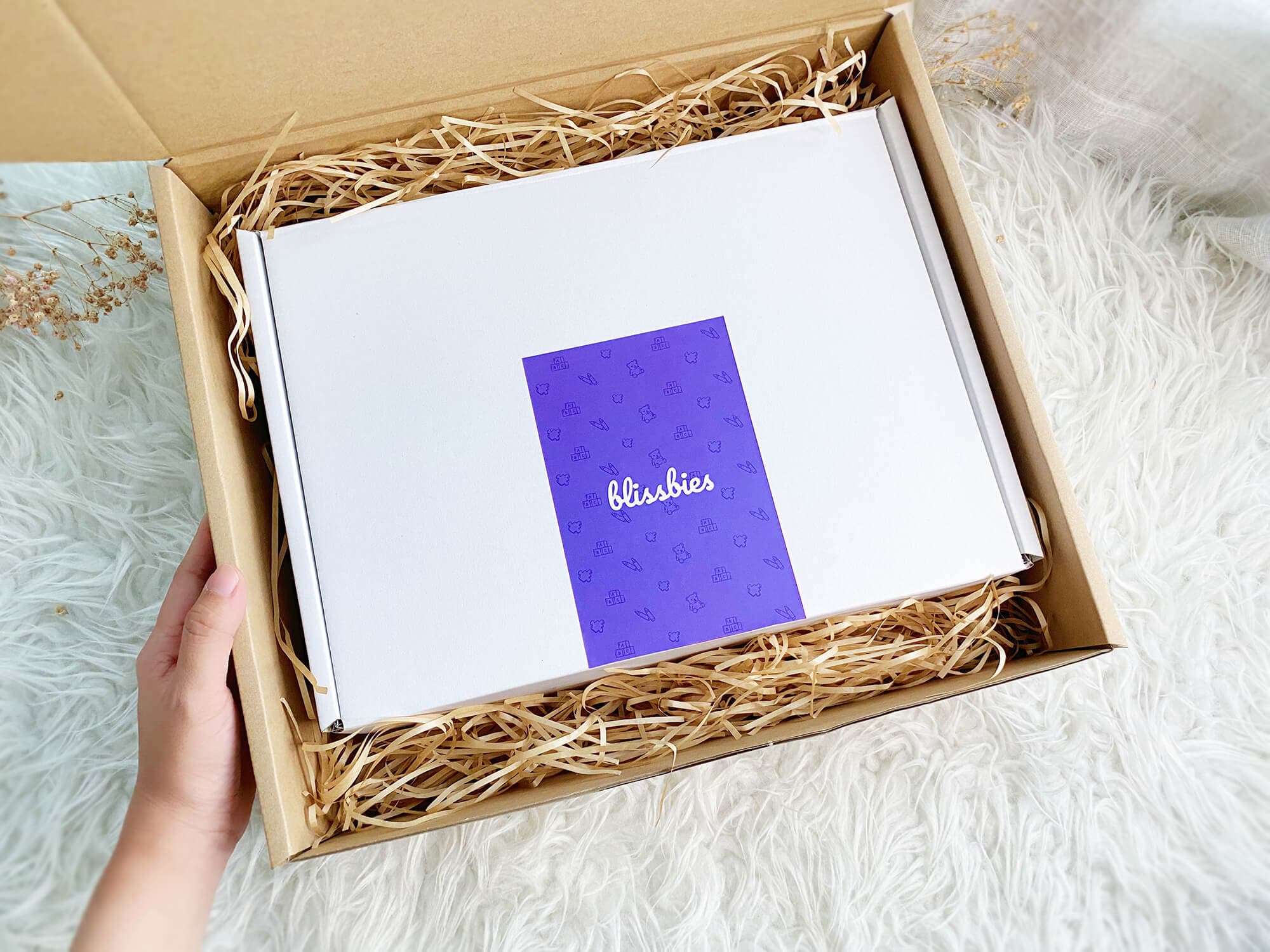 Blissbies gift box packed in a kraft shipping box