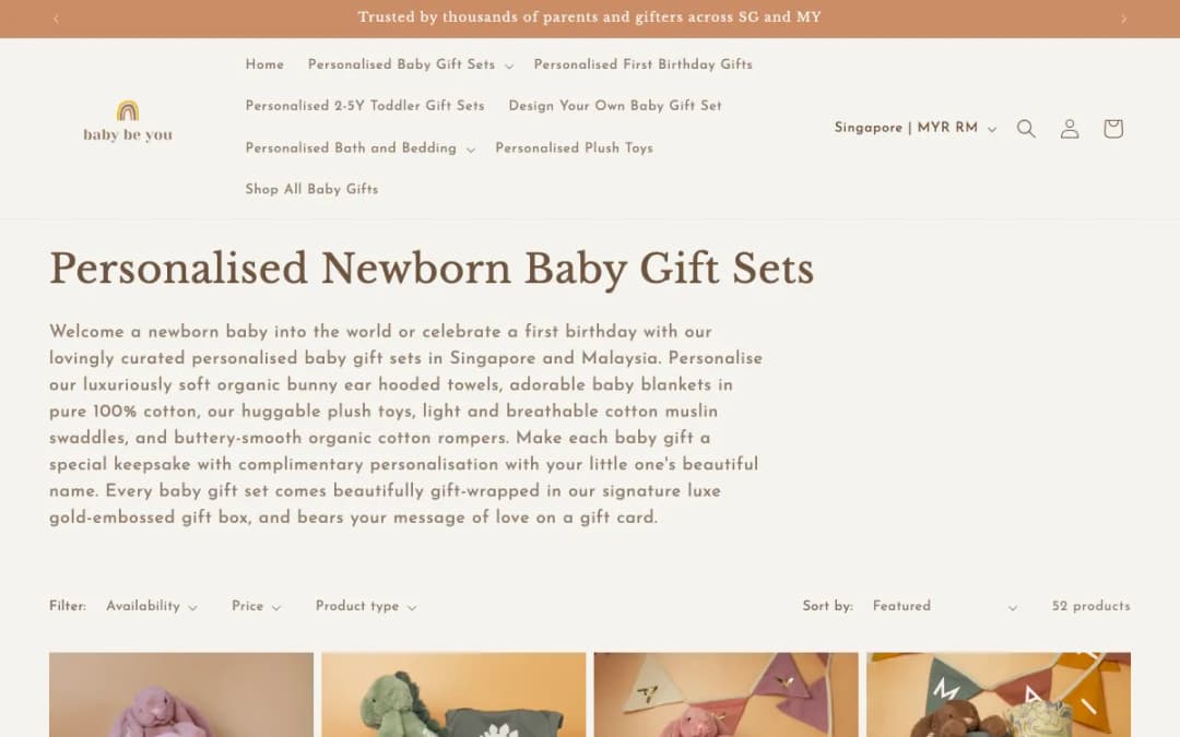 Screenshot of the Baby Be You personalised newborn baby gift sets page, taken 17 Oct 2026