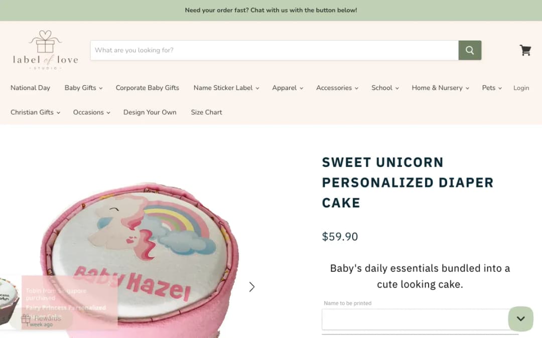 Screenshot of the Sweet Unicorn Personalized Diaper Cake page on labeloflovestudio.com, taken 18 Oct 2026